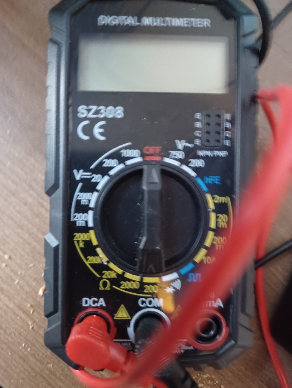 Black Digital Multimeter with Red Test Leads